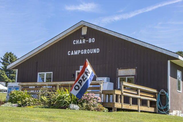 The Char-Bo Campground office, store and rec hall with an open flag out front
